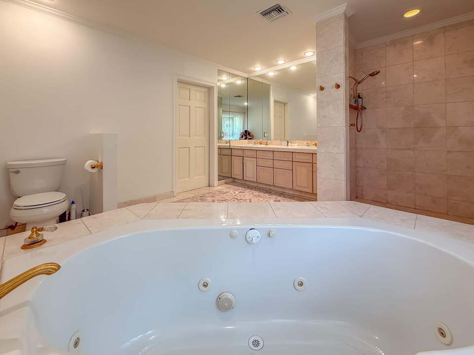 Primary bath with an oversized soaking tub and a walk-in shower